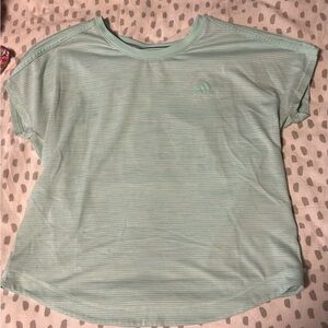 Blue adidas workout shirt.